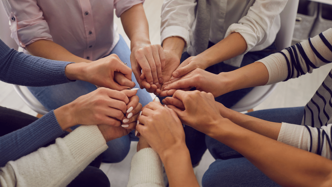 A group of people forming a circle to provide support and guidance to those who underwent gastric sleeve surgery.