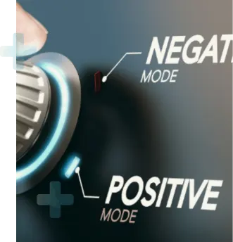 A person is selecting different modes by pushing a button labeled "positive" and "negative".