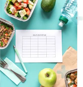A VSG Mexico meal plan with food and utensils set on a table.