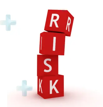 A red cube with the word "risk" stacked on top, symbolizing potential complications and dangers.