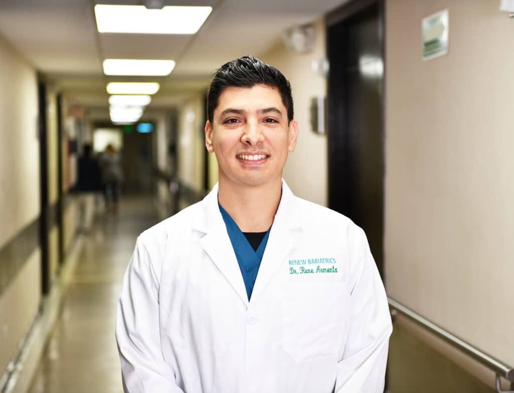Dr. Rene Armenta in his Renew Bariatrics white coat at the hospital in Tijuana
