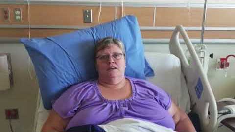 A successful gastric sleeve patient resting in a hospital bed.