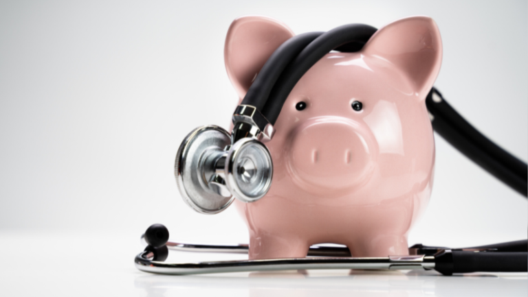 piggy bank for investing in bariatric surgery in mexico with stethoscope